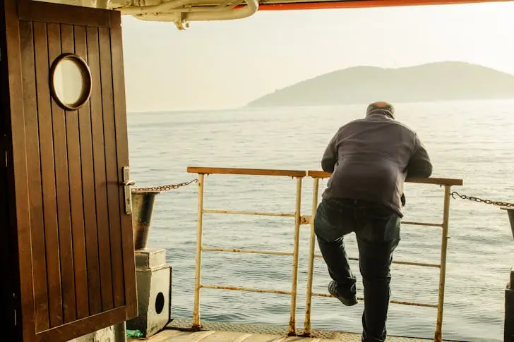 How should you pass a fishing boat?